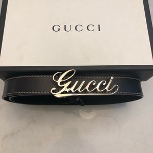 Gucci: men’s very rare Gucci cursive belt.  Silver